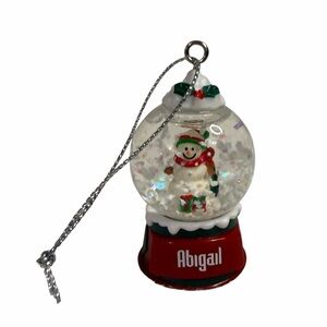 Festive Snow Globe Ornament with Snowman Personalized with the Name Abigail